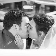 bride-groom-kiss-vintage-VW-beetle-wedding-car-cripps-barn-wedding-photographer-nikki-kirk-photography-cotswold-wedding-photographer.jpg